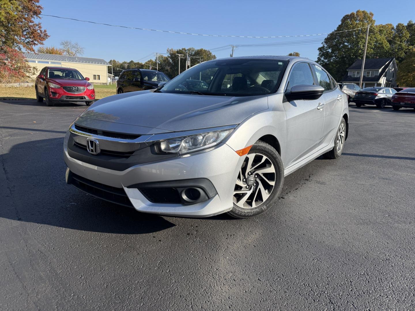 2017 Silver /Black Honda Civic EX Honda Sensing Sedan CVT (19XFC2F86HE) with an 2.0L I4 DOHC 16V engine, Automatic transmission, located at 547 E. Main St., Orwell, OH, 44076, (440) 437-5893, 41.535435, -80.847855 - 2017 Honda Civic EX Sedan – Efficient Daily Driver with Honda Sensing This 2017 Honda Civic EX Sedan is finished in Lunar Silver Metallic on 16" alloy wheels, with daytime running lights and dusk-sensing headlights. It has the clean, practical look the Civic is known for. The 2.0L K20 engine deli- Photo#0