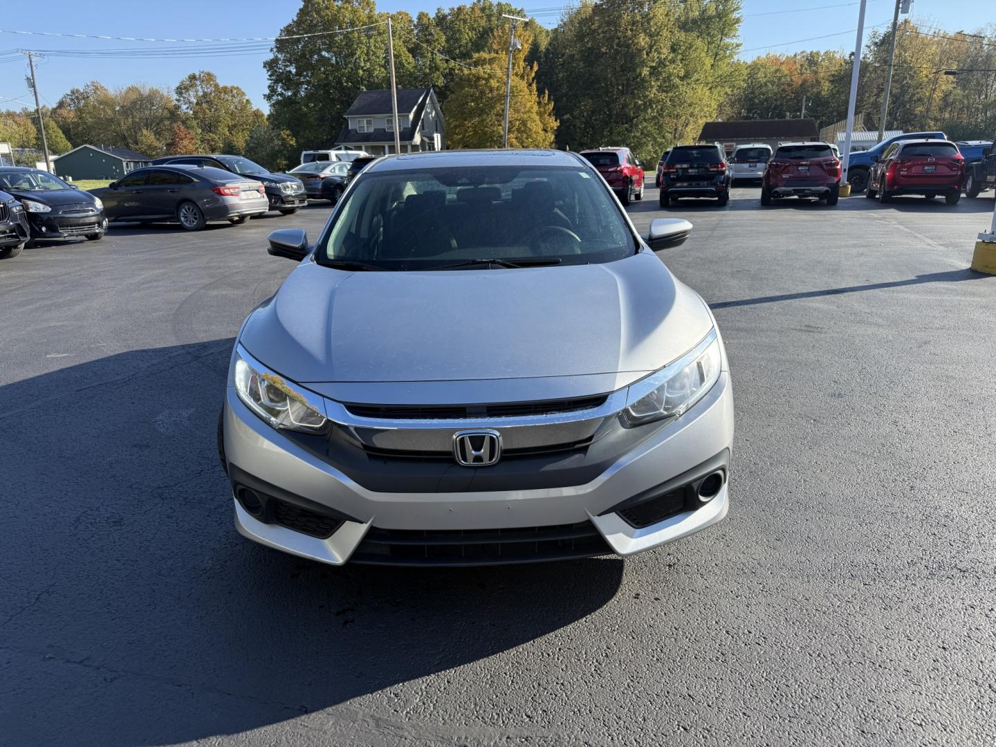 2017 Silver /Black Honda Civic EX Honda Sensing Sedan CVT (19XFC2F86HE) with an 2.0L I4 DOHC 16V engine, Automatic transmission, located at 547 E. Main St., Orwell, OH, 44076, (440) 437-5893, 41.535435, -80.847855 - 2017 Honda Civic EX Sedan – Efficient Daily Driver with Honda Sensing This 2017 Honda Civic EX Sedan is finished in Lunar Silver Metallic on 16" alloy wheels, with daytime running lights and dusk-sensing headlights. It has the clean, practical look the Civic is known for. The 2.0L K20 engine deli- Photo#1