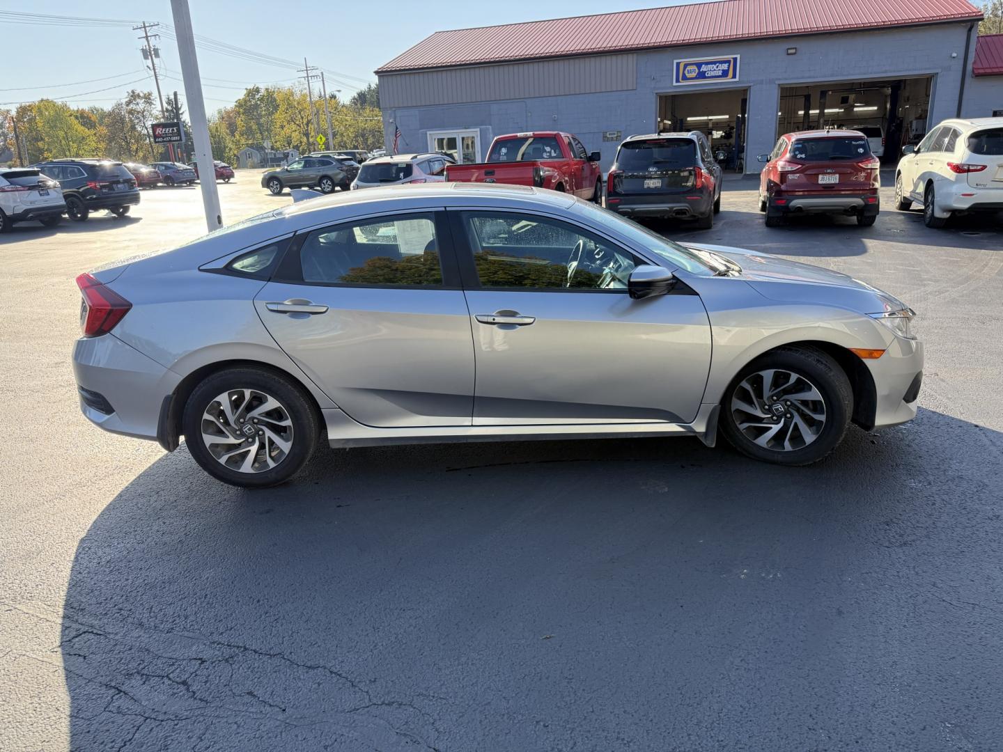 2017 Silver /Black Honda Civic EX Honda Sensing Sedan CVT (19XFC2F86HE) with an 2.0L I4 DOHC 16V engine, Automatic transmission, located at 547 E. Main St., Orwell, OH, 44076, (440) 437-5893, 41.535435, -80.847855 - 2017 Honda Civic EX Sedan – Efficient Daily Driver with Honda Sensing This 2017 Honda Civic EX Sedan is finished in Lunar Silver Metallic on 16" alloy wheels, with daytime running lights and dusk-sensing headlights. It has the clean, practical look the Civic is known for. The 2.0L K20 engine deli- Photo#23