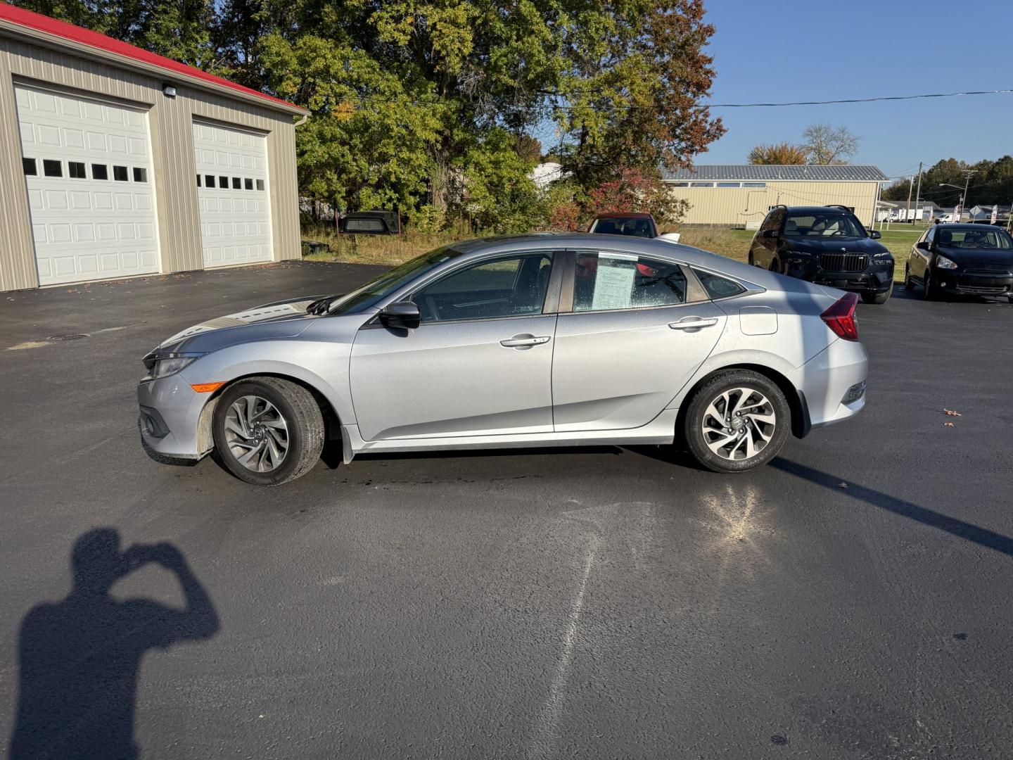 2017 Silver /Black Honda Civic EX Honda Sensing Sedan CVT (19XFC2F86HE) with an 2.0L I4 DOHC 16V engine, Automatic transmission, located at 547 E. Main St., Orwell, OH, 44076, (440) 437-5893, 41.535435, -80.847855 - 2017 Honda Civic EX Sedan – Efficient Daily Driver with Honda Sensing This 2017 Honda Civic EX Sedan is finished in Lunar Silver Metallic on 16" alloy wheels, with daytime running lights and dusk-sensing headlights. It has the clean, practical look the Civic is known for. The 2.0L K20 engine deli- Photo#31