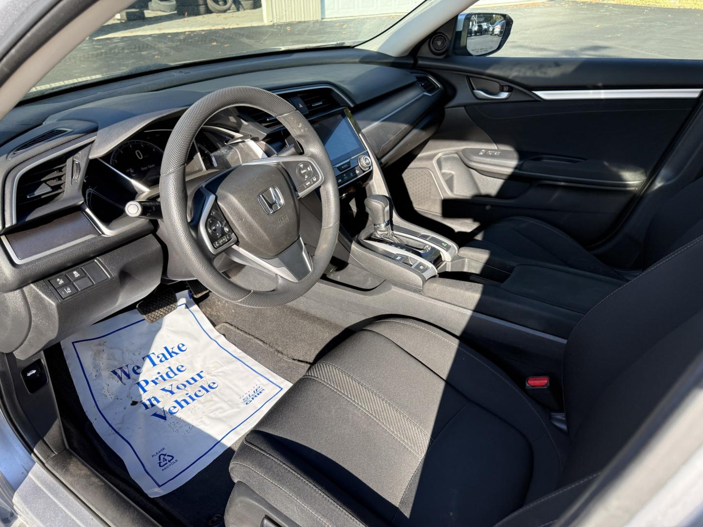 2017 Silver /Black Honda Civic EX Honda Sensing Sedan CVT (19XFC2F86HE) with an 2.0L I4 DOHC 16V engine, Automatic transmission, located at 547 E. Main St., Orwell, OH, 44076, (440) 437-5893, 41.535435, -80.847855 - 2017 Honda Civic EX Sedan – Efficient Daily Driver with Honda Sensing This 2017 Honda Civic EX Sedan is finished in Lunar Silver Metallic on 16" alloy wheels, with daytime running lights and dusk-sensing headlights. It has the clean, practical look the Civic is known for. The 2.0L K20 engine deli- Photo#7
