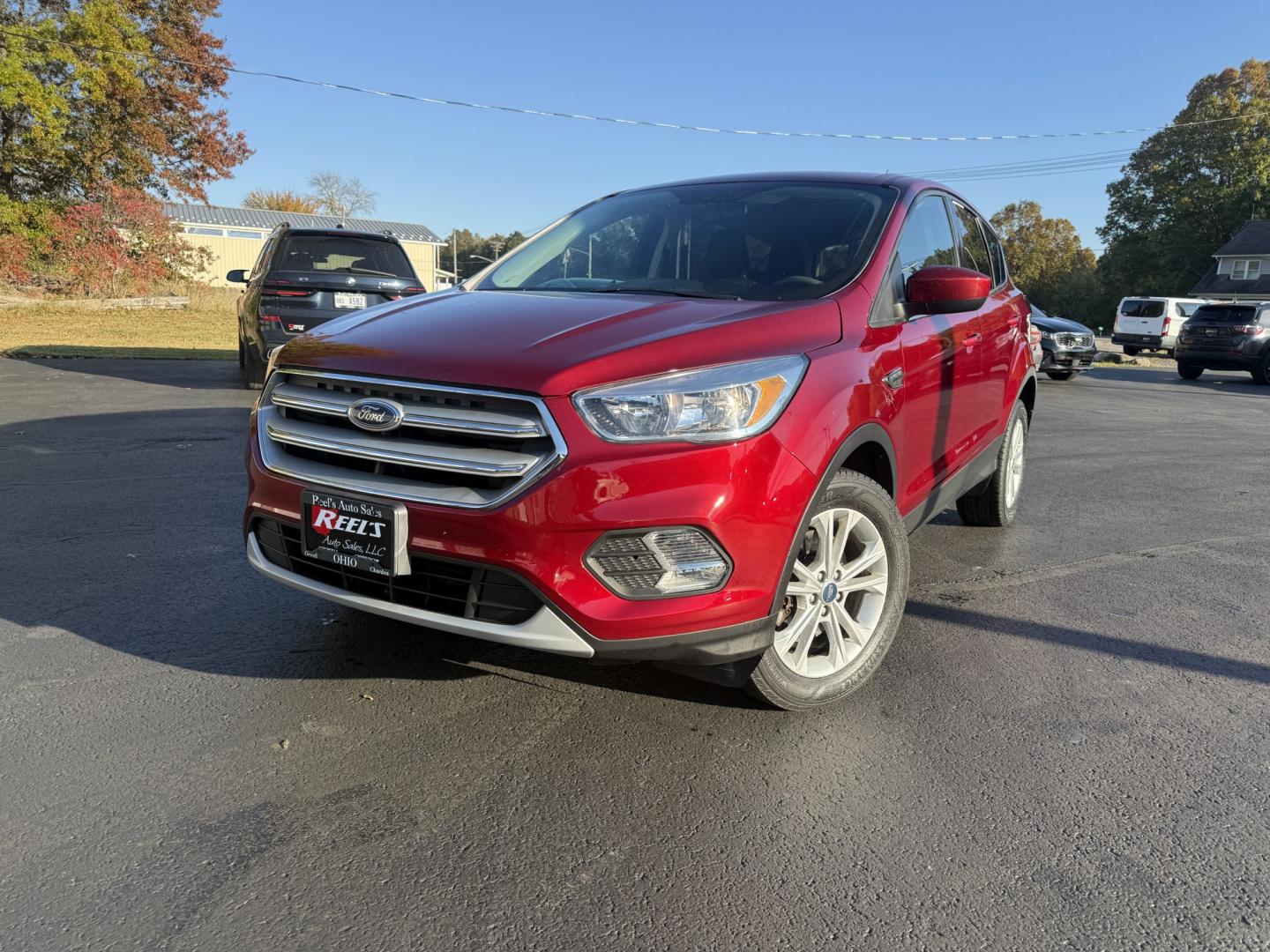 2019 Red /Black Ford Escape SE 4WD (1FMCU9GD3KU) with an 1.5L I4 DOHC 16V TURBO engine, Automatic transmission, located at 547 E. Main St., Orwell, OH, 44076, (440) 437-5893, 41.535435, -80.847855 - 2019 Ford Escape SE 4WD – Practical Compact Crossover with EcoBoost Efficiency - One Owner Carfax This 2019 Ford Escape SE 4WD is finished in Ruby Red Metallic on 17" aluminum wheels, with daytime running lights and dusk-sensing headlights. It keeps a clean, everyday look. The 1.5L turbocharged E- Photo#0