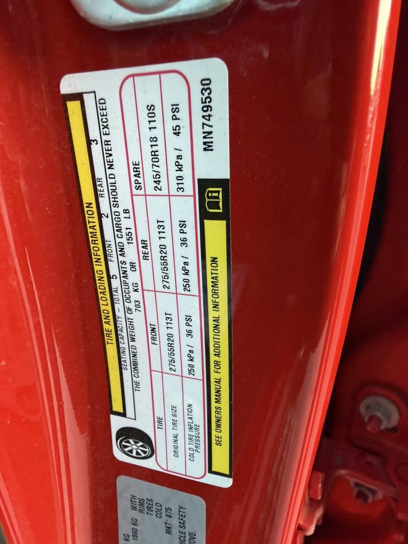 2021 Red /Black Ram 1500 Big Horn Crew Cab SWB 4WD (1C6SRFFT9MN) with an 5.7L V8 OHV 16V engine, 8A transmission, located at 547 E. Main St., Orwell, OH, 44076, (440) 437-5893, 41.535435, -80.847855 - 2021 Ram 1500 Big Horn Crew Cab 4WD – Night Edition Look That Stands Out This 2021 Ram 1500 Big Horn Crew Cab 4WD is finished in Flame Red with the Night Edition package and 20" black aluminum wheels. The blacked-out wheels, full LED exterior lighting, and clean one-owner Carfax history give it a- Photo#43