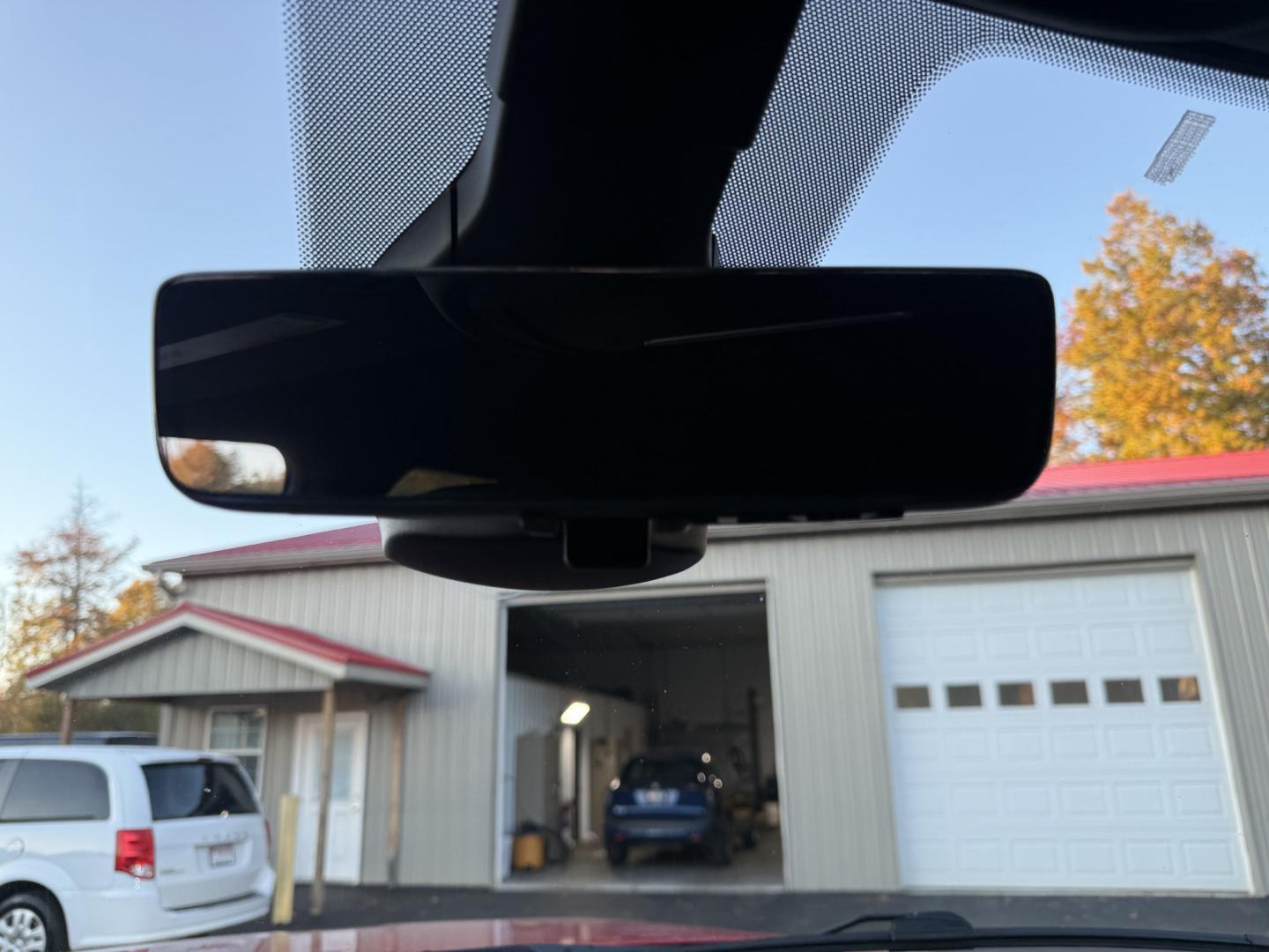 2021 Red /Black Ram 1500 Big Horn Crew Cab SWB 4WD (1C6SRFFT9MN) with an 5.7L V8 OHV 16V engine, 8A transmission, located at 547 E. Main St., Orwell, OH, 44076, (440) 437-5893, 41.535435, -80.847855 - 2021 Ram 1500 Big Horn Crew Cab 4WD – Night Edition Look That Stands Out This 2021 Ram 1500 Big Horn Crew Cab 4WD is finished in Flame Red with the Night Edition package and 20" black aluminum wheels. The blacked-out wheels, full LED exterior lighting, and clean one-owner Carfax history give it a- Photo#23