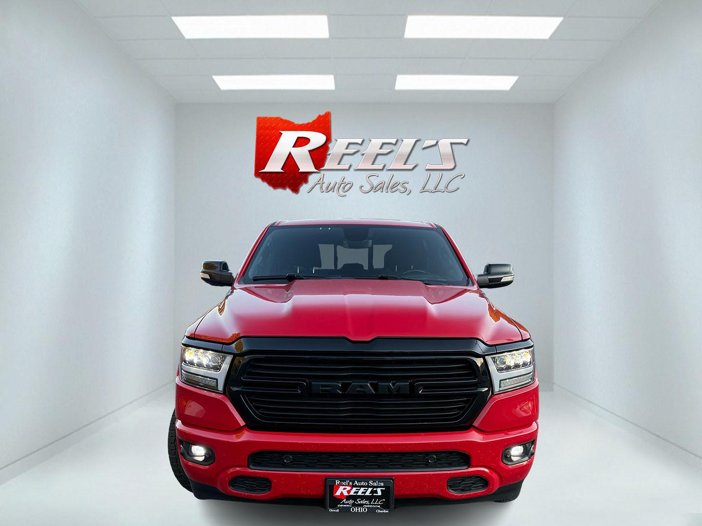 2021 Red /Black Ram 1500 Big Horn Crew Cab SWB 4WD (1C6SRFFT9MN) with an 5.7L V8 OHV 16V engine, 8A transmission, located at 547 E. Main St., Orwell, OH, 44076, (440) 437-5893, 41.535435, -80.847855 - 2021 Ram 1500 Big Horn Crew Cab 4WD – Night Edition Look That Stands Out This 2021 Ram 1500 Big Horn Crew Cab 4WD is finished in Flame Red with the Night Edition package and 20" black aluminum wheels. The blacked-out wheels, full LED exterior lighting, and clean one-owner Carfax history give it a- Photo#1