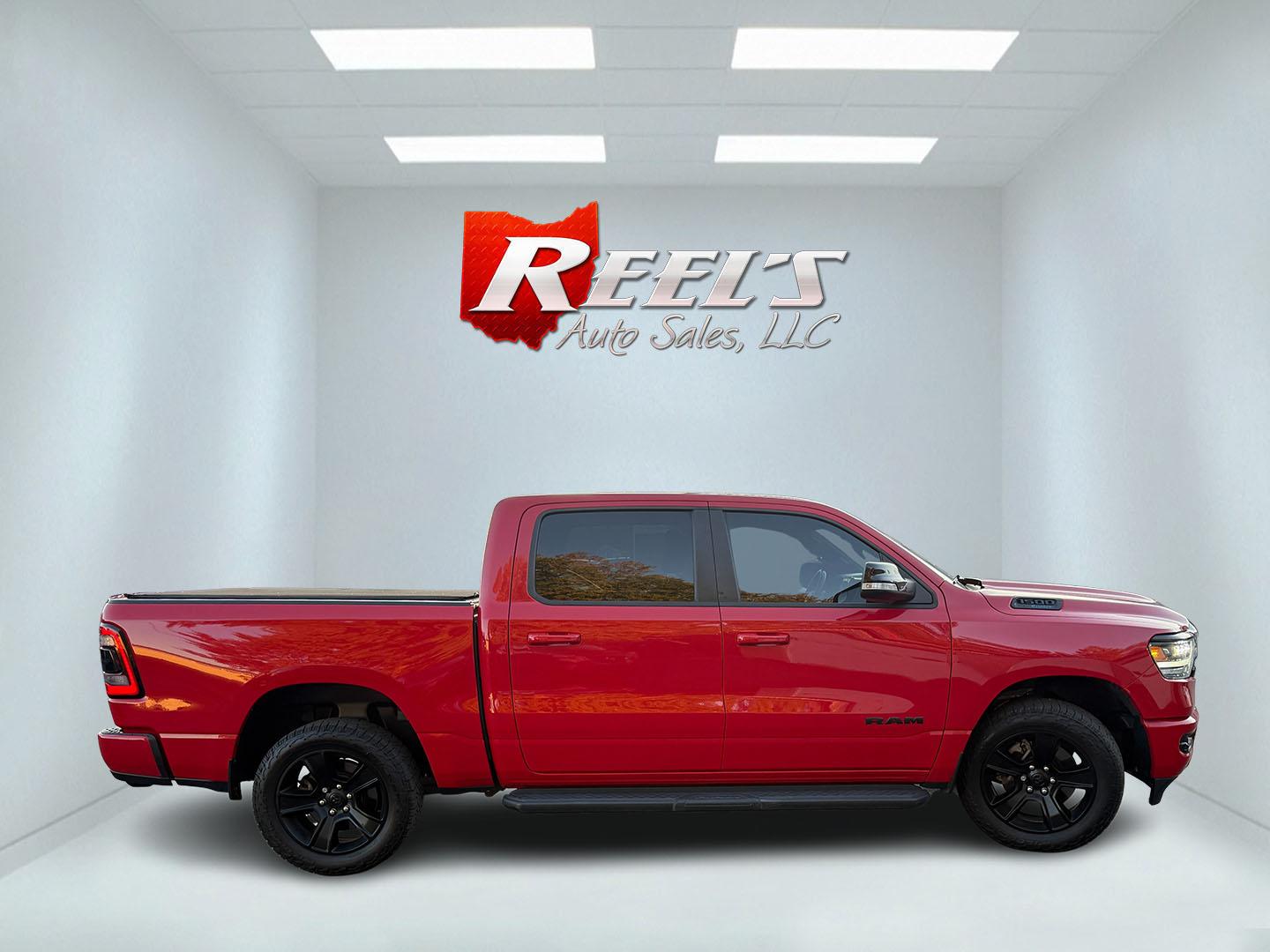2021 Red /Black Ram 1500 Big Horn Crew Cab SWB 4WD (1C6SRFFT9MN) with an 5.7L V8 OHV 16V engine, 8A transmission, located at 547 E. Main St., Orwell, OH, 44076, (440) 437-5893, 41.535435, -80.847855 - 2021 Ram 1500 Big Horn Crew Cab 4WD – Night Edition Look That Stands Out This 2021 Ram 1500 Big Horn Crew Cab 4WD is finished in Flame Red with the Night Edition package and 20" black aluminum wheels. The blacked-out wheels, full LED exterior lighting, and clean one-owner Carfax history give it a- Photo#33