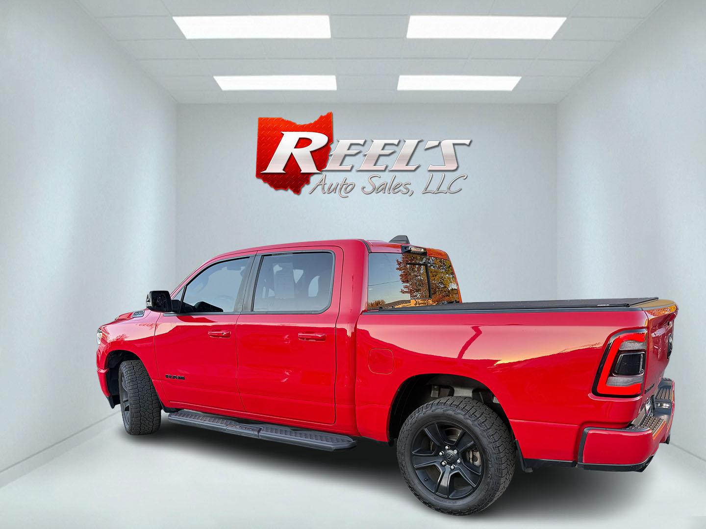 2021 Red /Black Ram 1500 Big Horn Crew Cab SWB 4WD (1C6SRFFT9MN) with an 5.7L V8 OHV 16V engine, 8A transmission, located at 547 E. Main St., Orwell, OH, 44076, (440) 437-5893, 41.535435, -80.847855 - 2021 Ram 1500 Big Horn Crew Cab 4WD – Night Edition Look That Stands Out This 2021 Ram 1500 Big Horn Crew Cab 4WD is finished in Flame Red with the Night Edition package and 20" black aluminum wheels. The blacked-out wheels, full LED exterior lighting, and clean one-owner Carfax history give it a- Photo#38