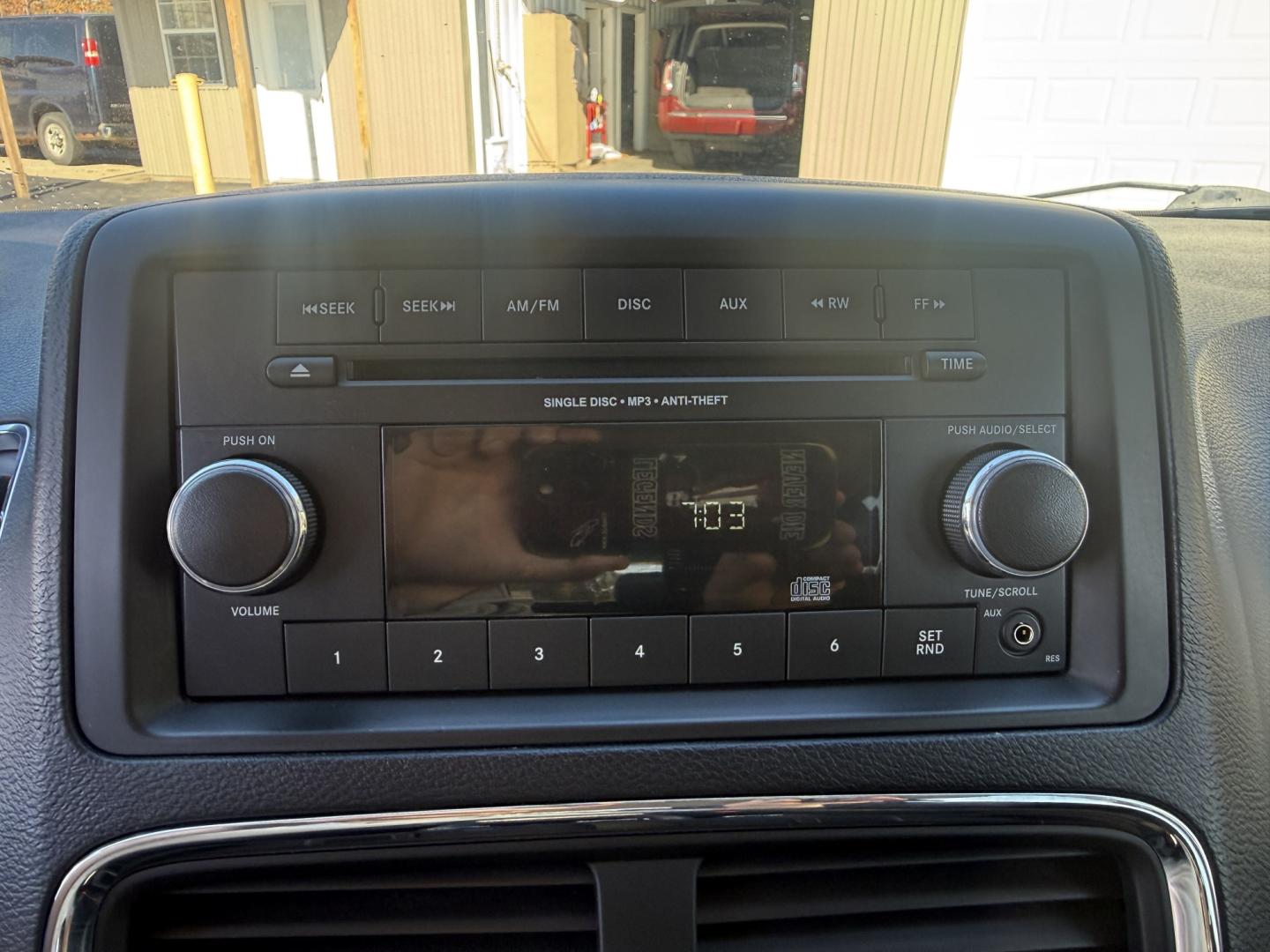2016 White /Black Dodge Grand Caravan SE (2C4RDGBG7GR) with an 3.6L V6 DOHC 24V engine, Automatic transmission, located at 547 E. Main St., Orwell, OH, 44076, (440) 437-5893, 41.535435, -80.847855 - 2016 Dodge Grand Caravan SE – One-Owner with Stow N Go Seating This 2016 Dodge Grand Caravan SE is finished in Bright White Clear Coat with daytime running lights. One-owner Carfax history keeps the story simple .The 3.6L Pentastar V6 and 6-speed automatic deliver reliable everyday power with a s- Photo#11