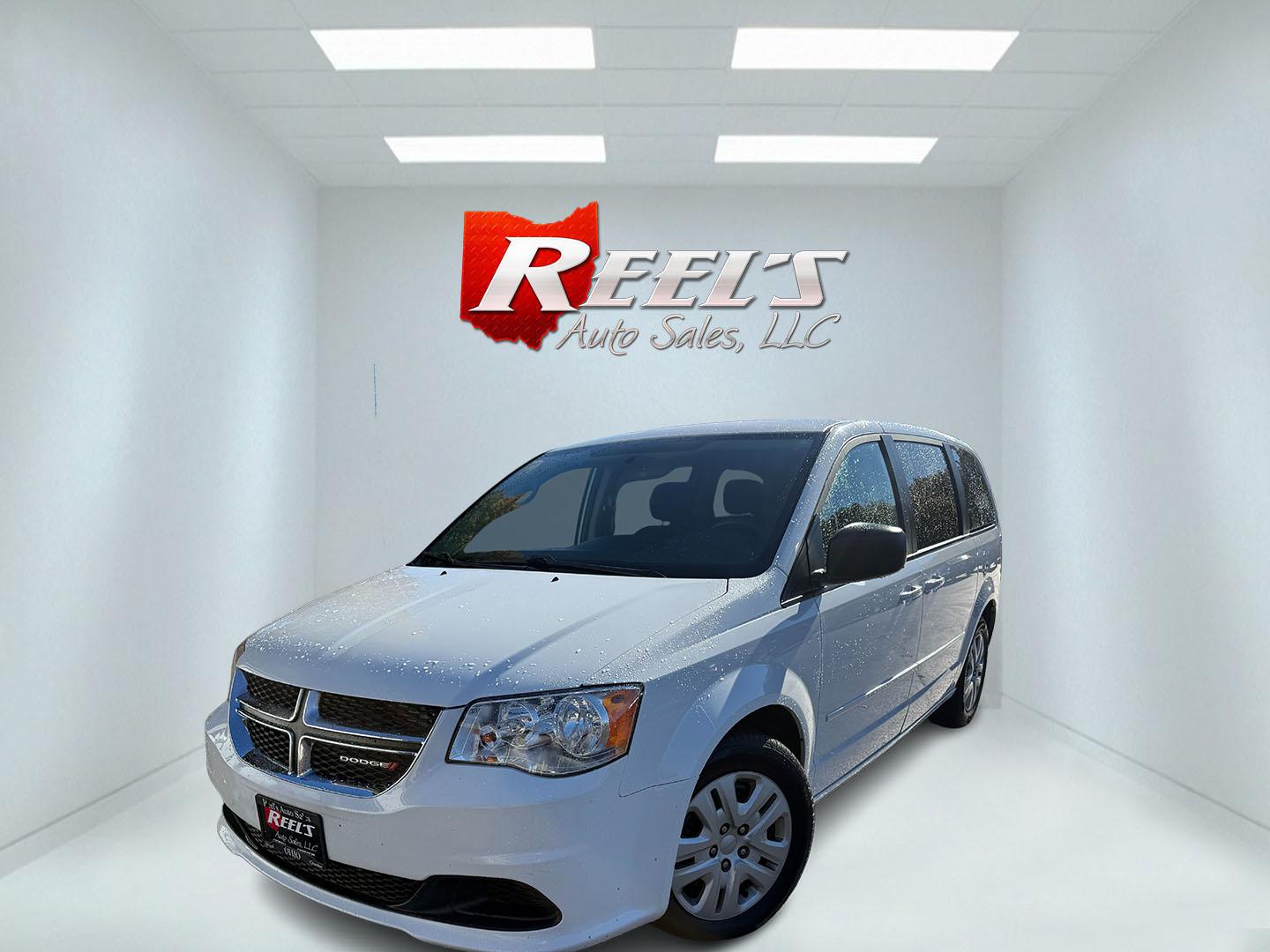 2016 White /Black Dodge Grand Caravan SE (2C4RDGBG7GR) with an 3.6L V6 DOHC 24V engine, Automatic transmission, located at 547 E. Main St., Orwell, OH, 44076, (440) 437-5893, 41.535435, -80.847855 - 2016 Dodge Grand Caravan SE – One-Owner with Stow N Go Seating This 2016 Dodge Grand Caravan SE is finished in Bright White Clear Coat with daytime running lights. One-owner Carfax history keeps the story simple .The 3.6L Pentastar V6 and 6-speed automatic deliver reliable everyday power with a s- Photo#0