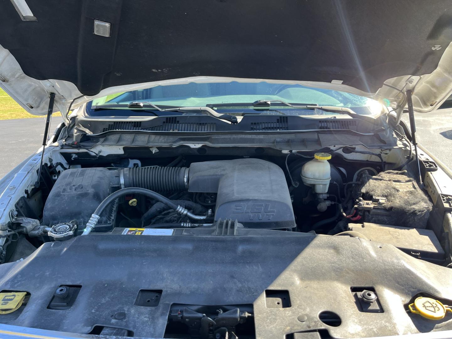 2017 White /Gray Ram 1500 Big Horn Crew Cab SWB 4WD (1C6RR7LG1HS) with an 3.6L V6 DOHC 24V FFV engine, Automatic transmission, located at 11115 Chardon Rd. , Chardon, OH, 44024, (440) 214-9705, 41.580246, -81.241943 - 2017 Ram 1500 Big Horn Crew Cab 4WD – Practical V6 with Heated Seats and Chrome Wheels This 2017 Ram 1500 Big Horn Crew Cab 4WD is finished in Bright White on 20" chrome wheels, with daytime running lights and dusk-sensing headlights. It has a clean, straightforward look. The 3.6L Pentastar V6 an- Photo#13