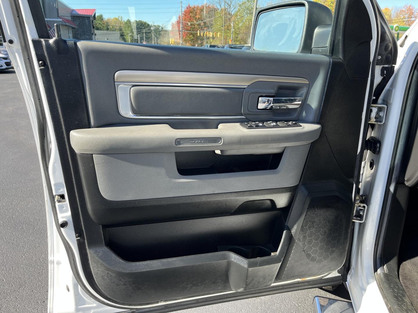 2017 White /Gray Ram 1500 Big Horn Crew Cab SWB 4WD (1C6RR7LG1HS) with an 3.6L V6 DOHC 24V FFV engine, Automatic transmission, located at 11115 Chardon Rd. , Chardon, OH, 44024, (440) 214-9705, 41.580246, -81.241943 - 2017 Ram 1500 Big Horn Crew Cab 4WD – Practical V6 with Heated Seats and Chrome Wheels This 2017 Ram 1500 Big Horn Crew Cab 4WD is finished in Bright White on 20" chrome wheels, with daytime running lights and dusk-sensing headlights. It has a clean, straightforward look. The 3.6L Pentastar V6 an- Photo#15