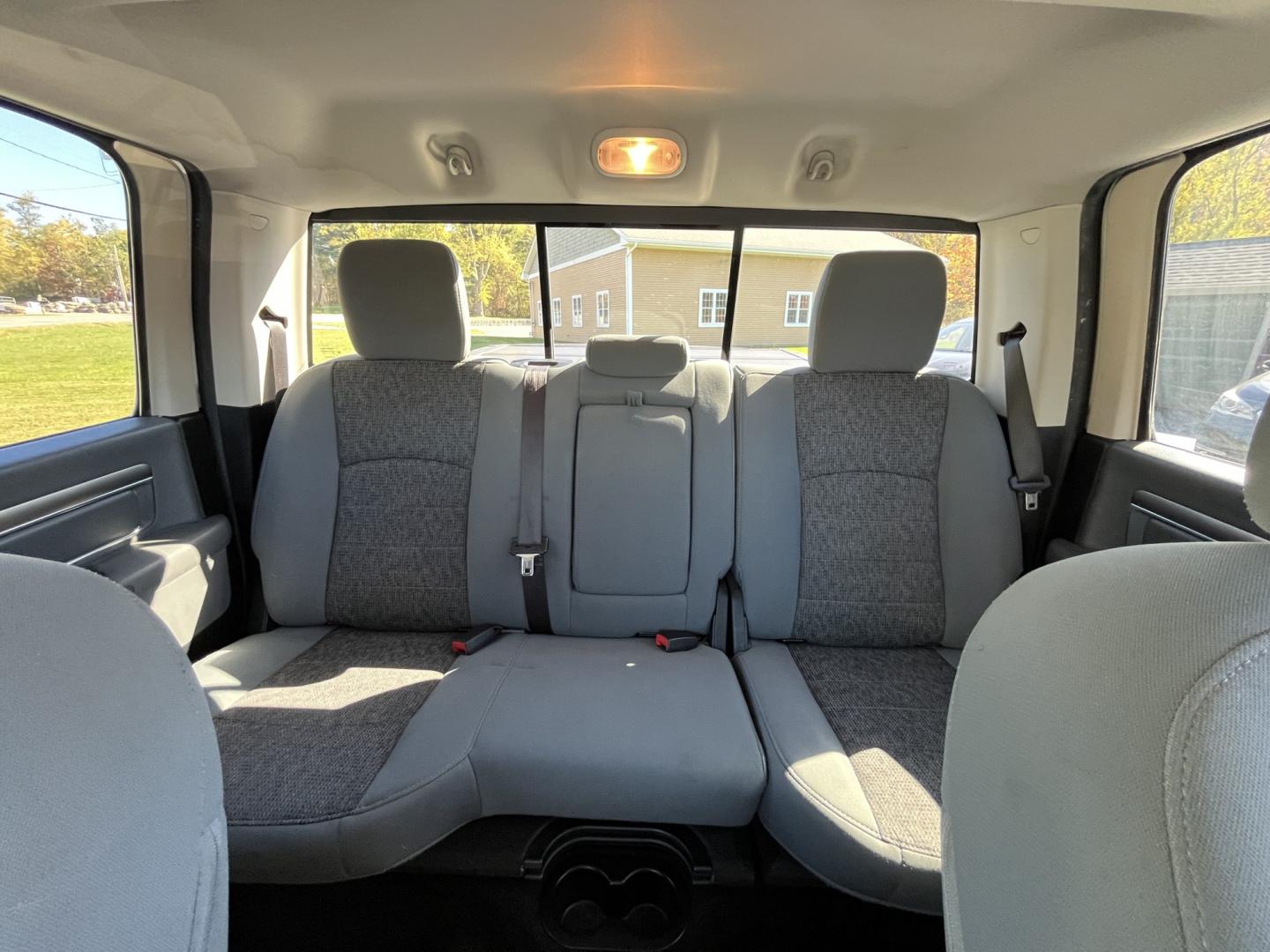 2017 White /Gray Ram 1500 Big Horn Crew Cab SWB 4WD (1C6RR7LG1HS) with an 3.6L V6 DOHC 24V FFV engine, Automatic transmission, located at 11115 Chardon Rd. , Chardon, OH, 44024, (440) 214-9705, 41.580246, -81.241943 - 2017 Ram 1500 Big Horn Crew Cab 4WD – Practical V6 with Heated Seats and Chrome Wheels This 2017 Ram 1500 Big Horn Crew Cab 4WD is finished in Bright White on 20" chrome wheels, with daytime running lights and dusk-sensing headlights. It has a clean, straightforward look. The 3.6L Pentastar V6 an- Photo#24