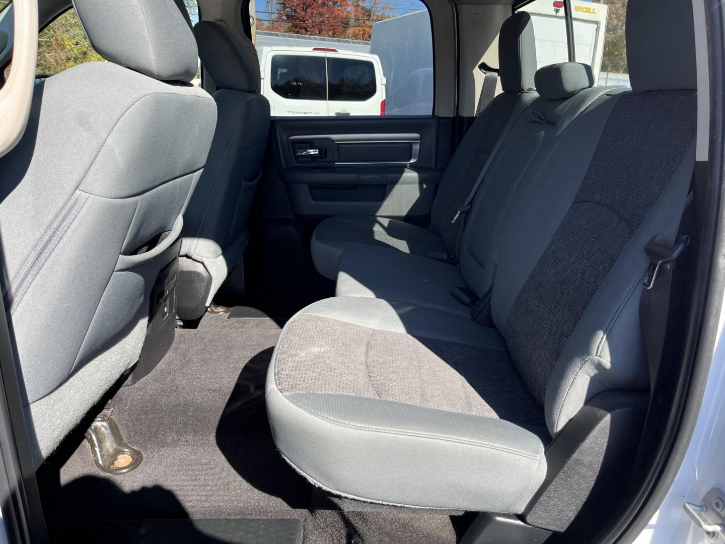 2017 White /Gray Ram 1500 Big Horn Crew Cab SWB 4WD (1C6RR7LG1HS) with an 3.6L V6 DOHC 24V FFV engine, Automatic transmission, located at 11115 Chardon Rd. , Chardon, OH, 44024, (440) 214-9705, 41.580246, -81.241943 - 2017 Ram 1500 Big Horn Crew Cab 4WD – Practical V6 with Heated Seats and Chrome Wheels This 2017 Ram 1500 Big Horn Crew Cab 4WD is finished in Bright White on 20" chrome wheels, with daytime running lights and dusk-sensing headlights. It has a clean, straightforward look. The 3.6L Pentastar V6 an- Photo#26