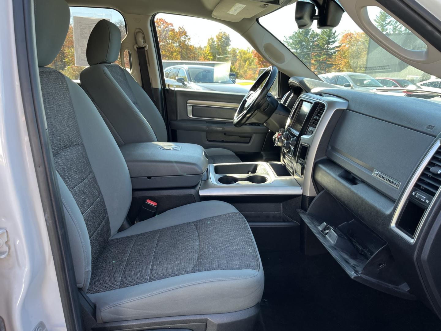 2017 White /Gray Ram 1500 Big Horn Crew Cab SWB 4WD (1C6RR7LG1HS) with an 3.6L V6 DOHC 24V FFV engine, Automatic transmission, located at 11115 Chardon Rd. , Chardon, OH, 44024, (440) 214-9705, 41.580246, -81.241943 - 2017 Ram 1500 Big Horn Crew Cab 4WD – Practical V6 with Heated Seats and Chrome Wheels This 2017 Ram 1500 Big Horn Crew Cab 4WD is finished in Bright White on 20" chrome wheels, with daytime running lights and dusk-sensing headlights. It has a clean, straightforward look. The 3.6L Pentastar V6 an- Photo#32
