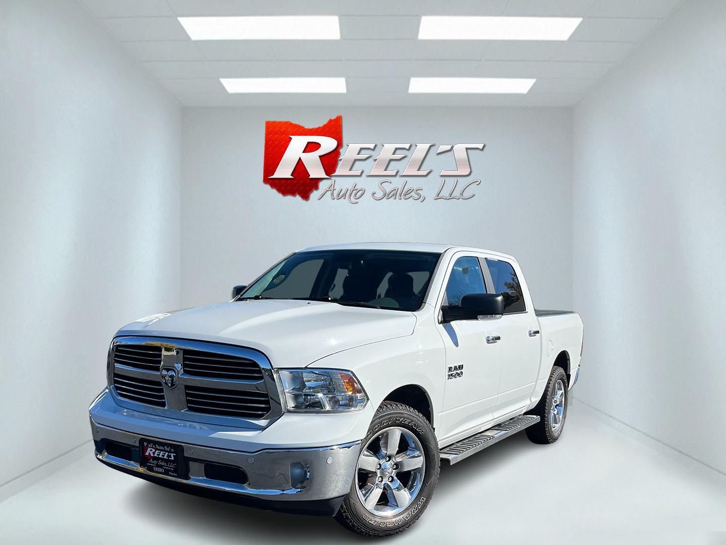 2017 White /Gray Ram 1500 Big Horn Crew Cab SWB 4WD (1C6RR7LG1HS) with an 3.6L V6 DOHC 24V FFV engine, Automatic transmission, located at 11115 Chardon Rd. , Chardon, OH, 44024, (440) 214-9705, 41.580246, -81.241943 - 2017 Ram 1500 Big Horn Crew Cab 4WD – Practical V6 with Heated Seats and Chrome Wheels This 2017 Ram 1500 Big Horn Crew Cab 4WD is finished in Bright White on 20" chrome wheels, with daytime running lights and dusk-sensing headlights. It has a clean, straightforward look. The 3.6L Pentastar V6 an- Photo#0