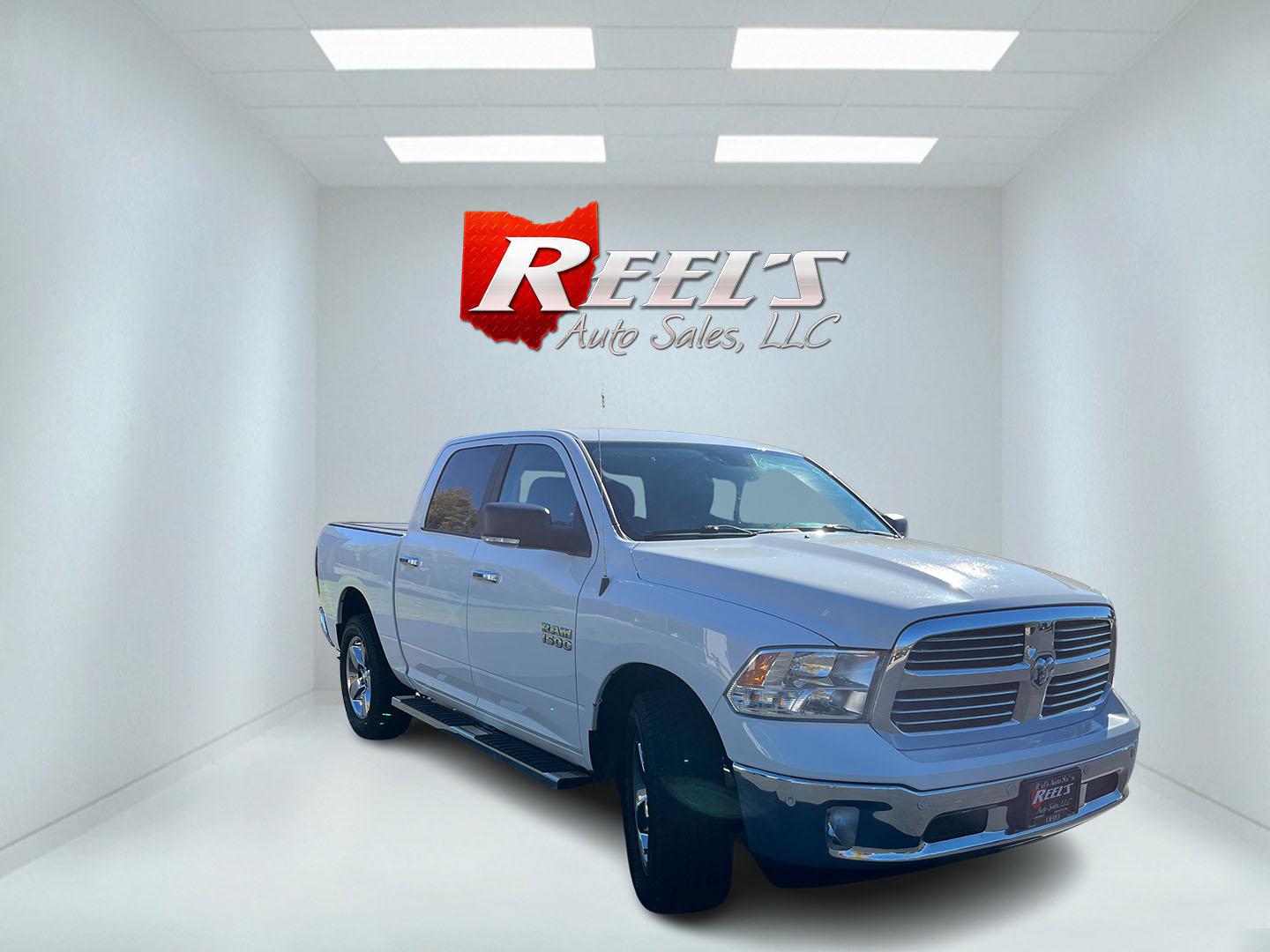 2017 White /Gray Ram 1500 Big Horn Crew Cab SWB 4WD (1C6RR7LG1HS) with an 3.6L V6 DOHC 24V FFV engine, Automatic transmission, located at 11115 Chardon Rd. , Chardon, OH, 44024, (440) 214-9705, 41.580246, -81.241943 - 2017 Ram 1500 Big Horn Crew Cab 4WD – Practical V6 with Heated Seats and Chrome Wheels This 2017 Ram 1500 Big Horn Crew Cab 4WD is finished in Bright White on 20" chrome wheels, with daytime running lights and dusk-sensing headlights. It has a clean, straightforward look. The 3.6L Pentastar V6 an- Photo#2