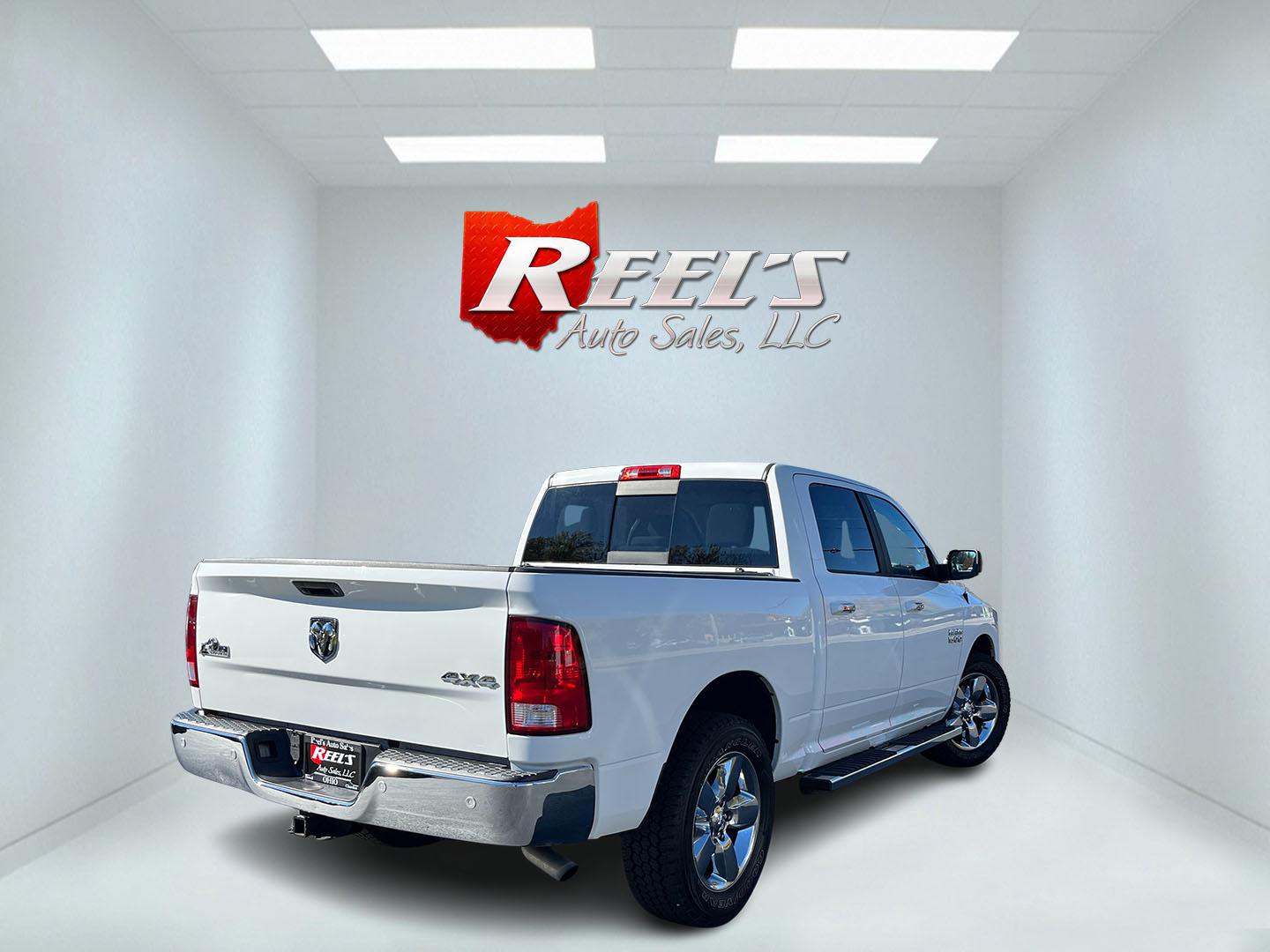 2017 White /Gray Ram 1500 Big Horn Crew Cab SWB 4WD (1C6RR7LG1HS) with an 3.6L V6 DOHC 24V FFV engine, Automatic transmission, located at 11115 Chardon Rd. , Chardon, OH, 44024, (440) 214-9705, 41.580246, -81.241943 - 2017 Ram 1500 Big Horn Crew Cab 4WD – Practical V6 with Heated Seats and Chrome Wheels This 2017 Ram 1500 Big Horn Crew Cab 4WD is finished in Bright White on 20" chrome wheels, with daytime running lights and dusk-sensing headlights. It has a clean, straightforward look. The 3.6L Pentastar V6 an- Photo#6
