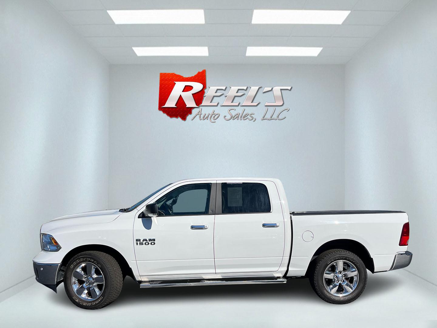 2017 White /Gray Ram 1500 Big Horn Crew Cab SWB 4WD (1C6RR7LG1HS) with an 3.6L V6 DOHC 24V FFV engine, Automatic transmission, located at 11115 Chardon Rd. , Chardon, OH, 44024, (440) 214-9705, 41.580246, -81.241943 - 2017 Ram 1500 Big Horn Crew Cab 4WD – Practical V6 with Heated Seats and Chrome Wheels This 2017 Ram 1500 Big Horn Crew Cab 4WD is finished in Bright White on 20" chrome wheels, with daytime running lights and dusk-sensing headlights. It has a clean, straightforward look. The 3.6L Pentastar V6 an- Photo#11